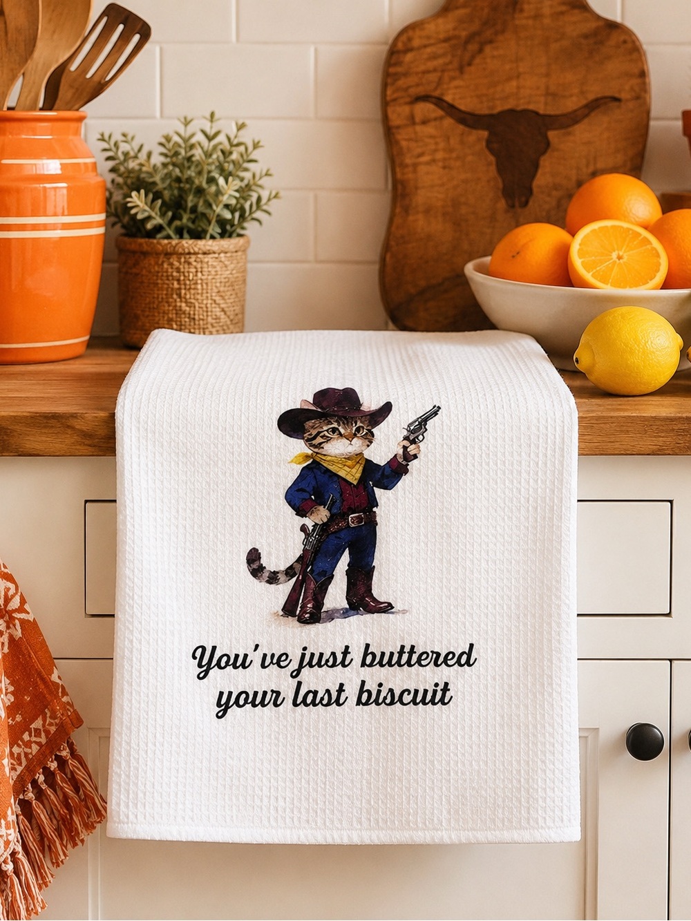 Cowboy Cat Kitchen Towel “You’ve Just Buttered Your Last Biscuit”